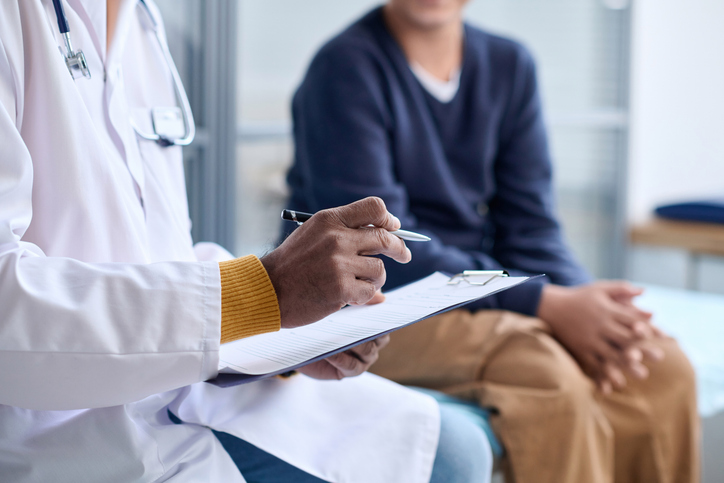 patient talking to doctor